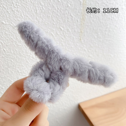 Plush grasping gray gray