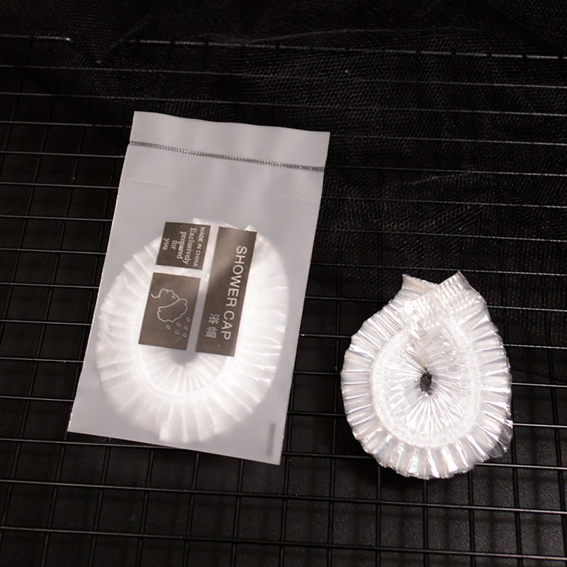 Shower cap individually packaged