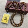 Middle amber chain + plastic Shurangama mantra
