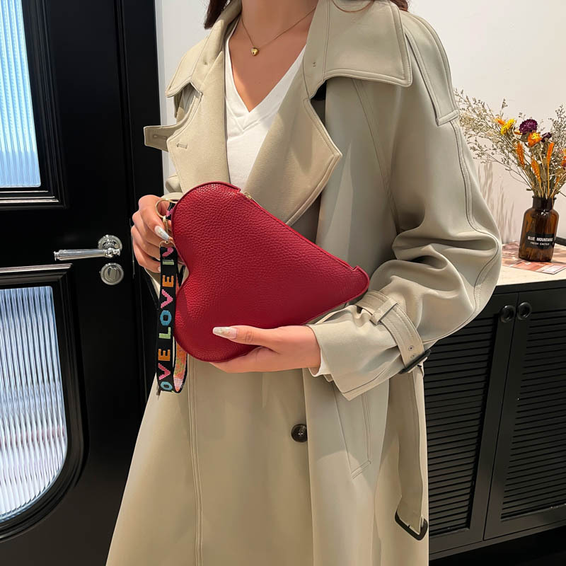 Nicho de diseño amor 2025 primavera nuevo alto valor facial este año popular bolsos de cambio bolsos de mano bolsos de mujer coreana moda