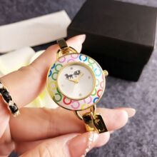 热卖新款创意女生大表盘手镯手表百搭圆形手链表开口腕表一件代发