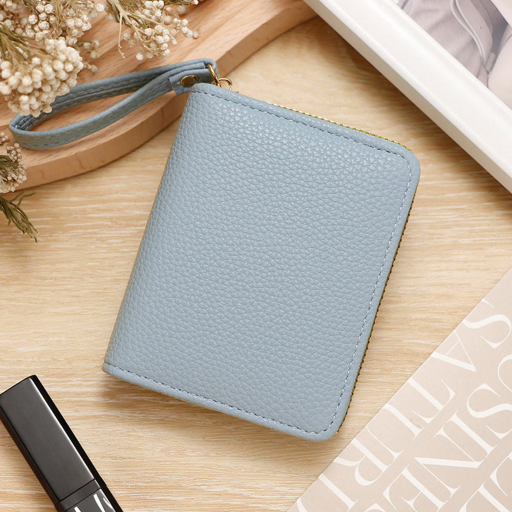 Nuevo PU damas corta monedas bolso de cambio de monedas de color sólido litchi gran capacidad cremallera cartera bolsa de tarjetas al por mayor