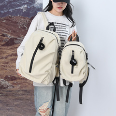 新型カバン学生バッグ軽量化登山バッグ高校の学生が旅行に出かけます。
