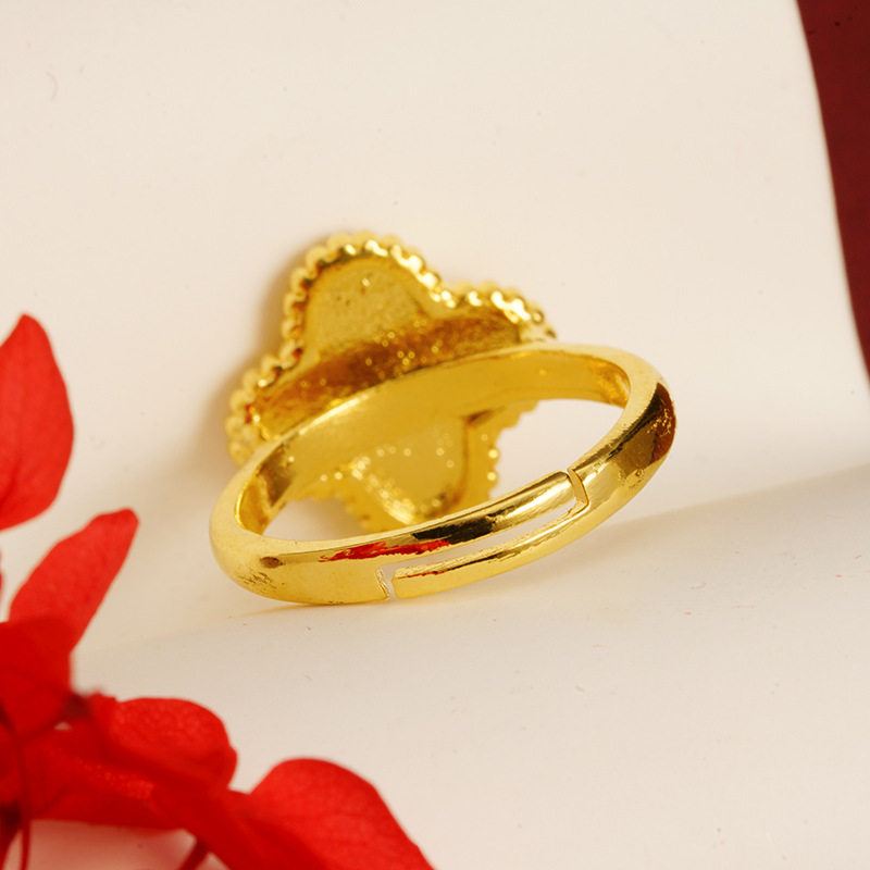 Flores de lujo ligero de cuatro hojas, anillos de flores de oro de arena vietnamita, estilo chino en vivo, explosión de la misma manera, simple y versátil.