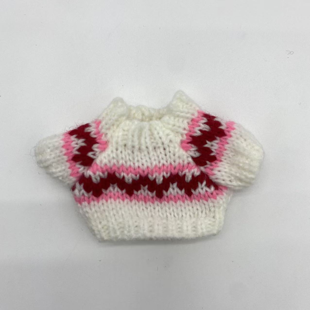 White sweater with red waves