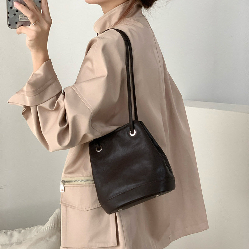 Wind crossbody bucket for women 2024 new single shoulder tote bag, niche high-end feeling, vegetable tanned cowhide_voghion.com