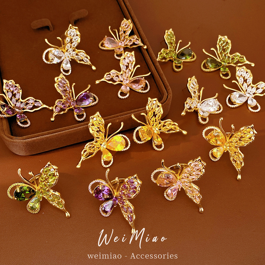 Oro verdadero electron-combustible mariposa de piedra pernos de orejas temperamento exquisito personalidad nicho pendientes ligero lujo conjunto de joyas de alta calidad