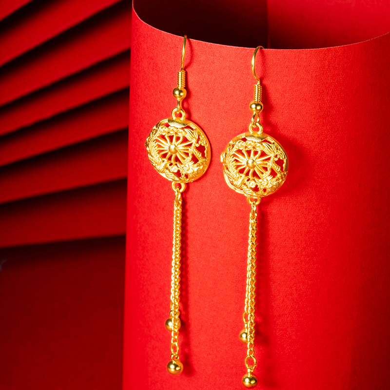 Nuevo dragón de oro de Vietnam y Fénix tallados pendientes huecos largos de borla de estilo chino festivo de las mujeres suministro directo de fábrica