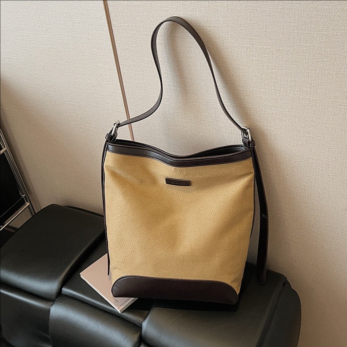 Transfronterizos de gran capacidad bolso de balde de mujer bolso versátil otoño / invierno 2025 nuevo tipo de mochila de hombro casual bolso de transporte