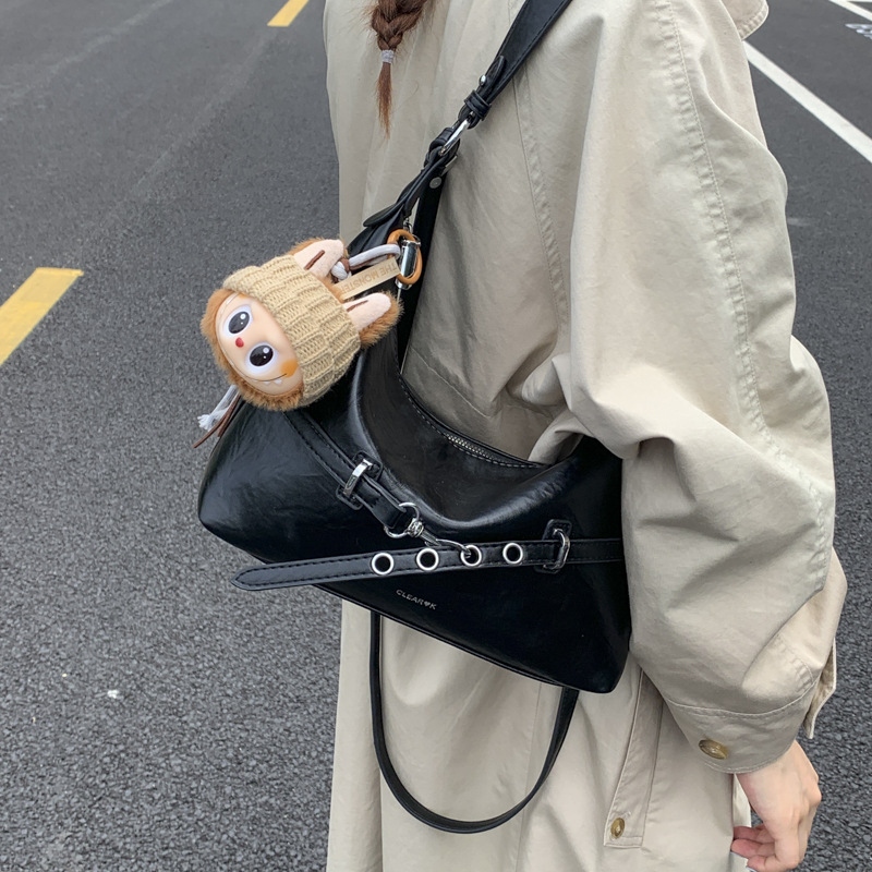 Bolsa de bolsillo de nicho francés de estilo extranjero para mujeres 2025 nueva moda versátil bolso de hombro de brazo de viaje bolso de hombro de hombro