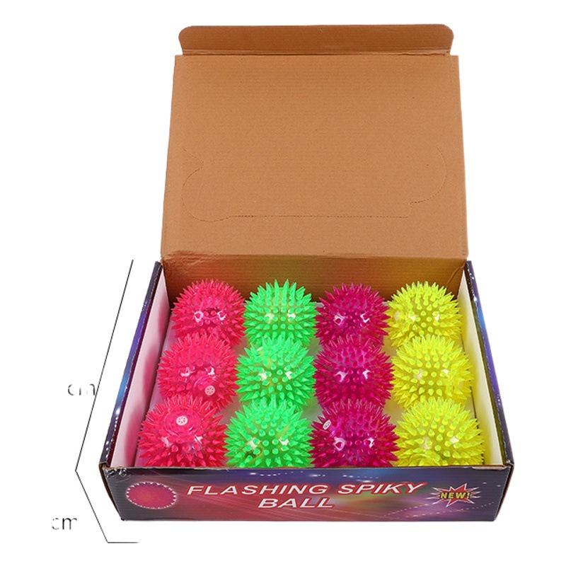 Juguete masticable para perros, éxito de ventas transfronterizo, limpieza de dientes, resistente a mordeduras, pelota de vinilo con púas, juguete con sonido para mascotas, venta al por mayor