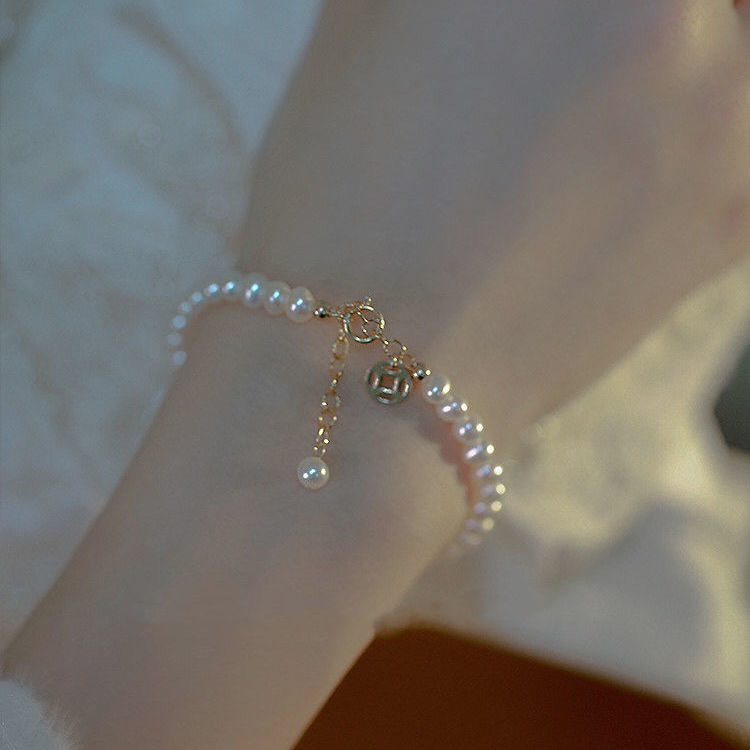 Exquisite retro high-grade pearl bracelet 2021 autumn new ins girlfriends with light luxury female niche design lucky Exquisite retro high-grade pearl bracelet 2021 autumn new ins girlfriends with light luxury female niche design lucky