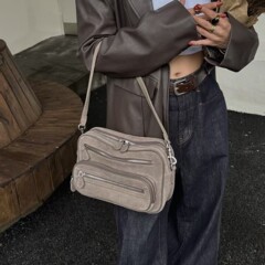 网红同款时尚暗黑多隔层拉链单肩斜挎包凹造型设计潮酷中性机车包
