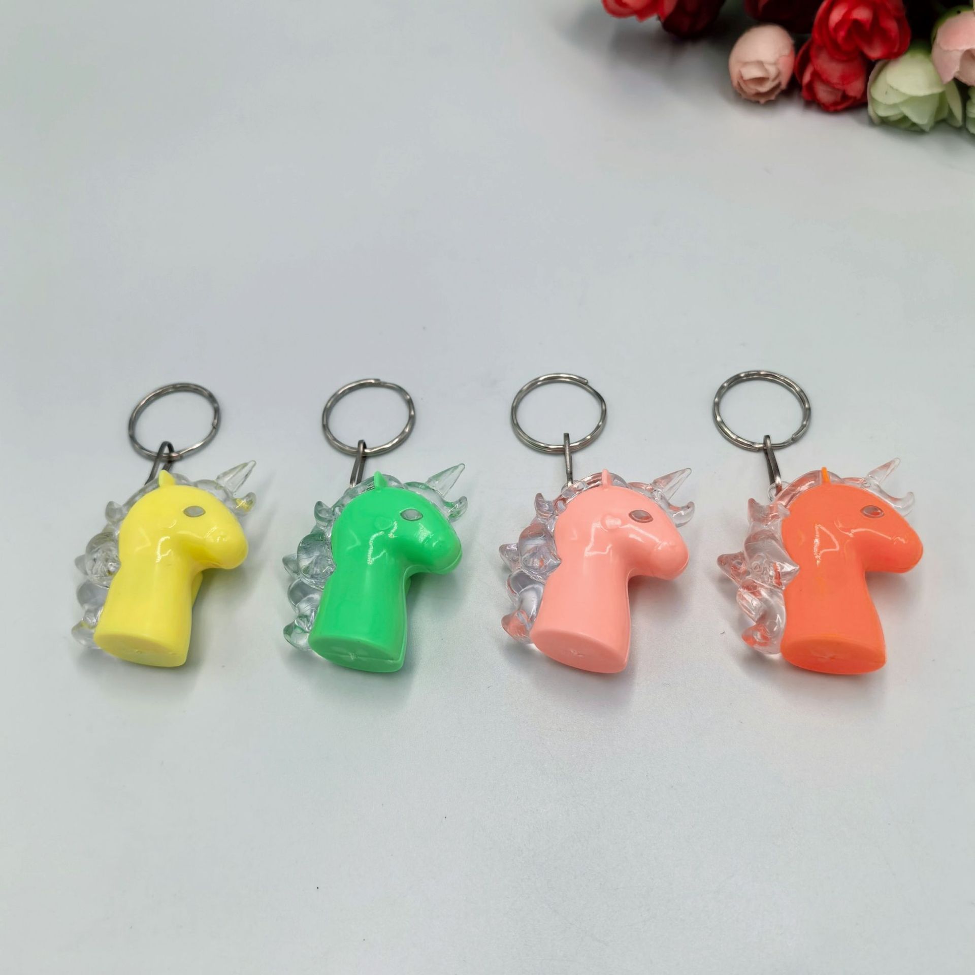 Unicornio luminoso transfronterizo llaverillo lámpara luminosa colgante llaverillo LED juguetes luminosos niños regalos creativos
