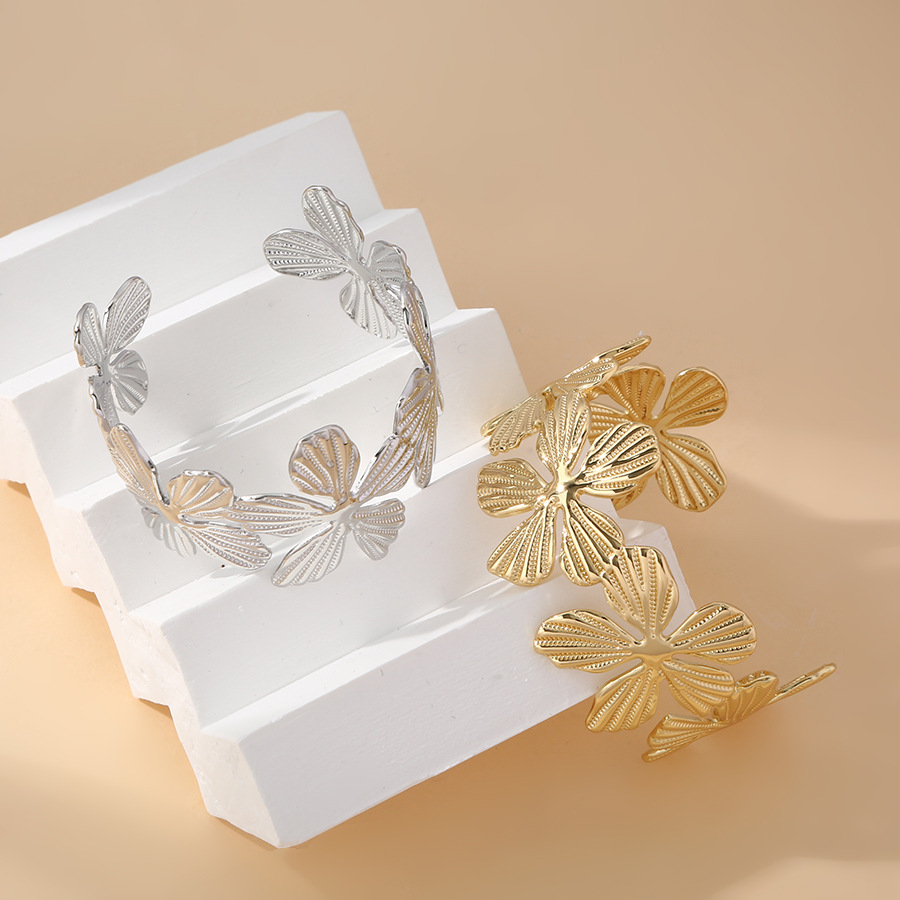 Europa y los Estados Unidos explotaron pulseras de flores de moda personalidad femenina de apertura retro empalme diseño ancho nicho de diseño de joyas