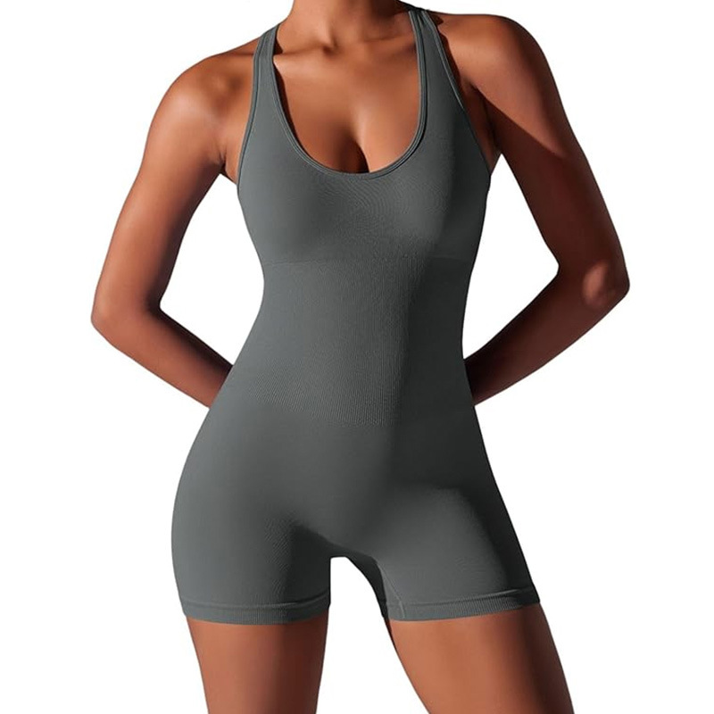 Nueva ropa de yoga europea y americana, mono de una pieza de color sólido ajustado, hermosa espalda aérea, mono de yoga transpirable sin costuras