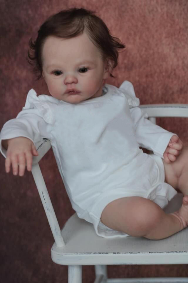 Como se muestra en la imagen de la muñeca