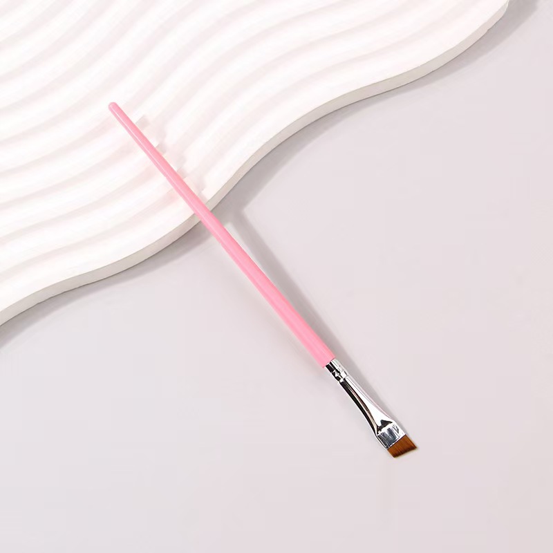 Los fabricantes venden directamente un solo cepillo de maquillaje, cepillo de pelo suave, sombra de ojos, cepillo de labios, herramientas portátiles de belleza y belleza al por mayor para principiantes