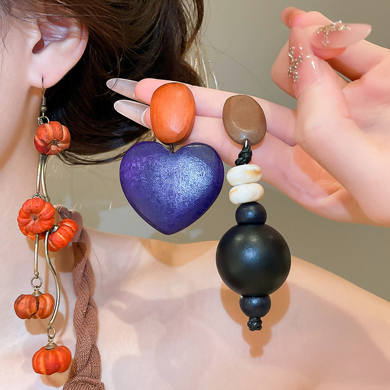 Silver needle wood heart pumpkin pendant earrings, niche high-end simple fashion stud earrings, unique and stylish women's earrings Silver needle wood heart pumpkin pendant earrings, niche high-end simple fashion stud earrings, unique and stylish women's earrings