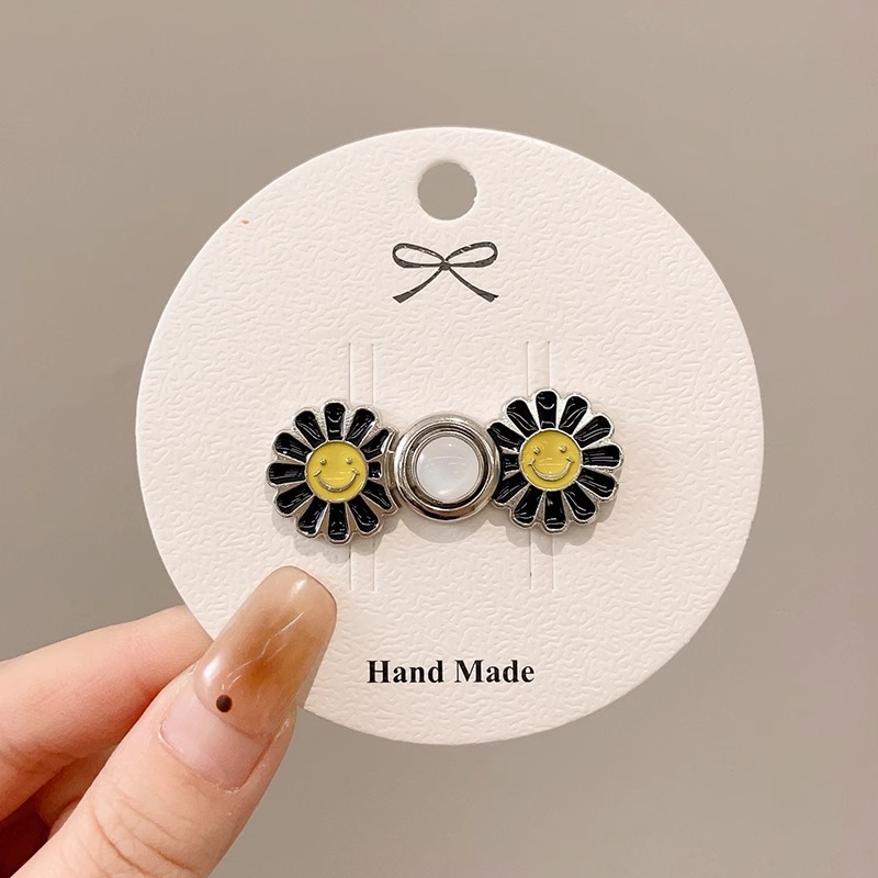 La cintura de los jeans se cambia a un botón de cintura pequeño, broche, falda de mujer, ajuste de cintura, dispositivo de ajuste, alfiler, botón anti-luz fijo