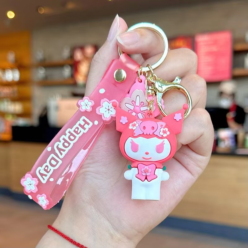 Perro de orejas grandes Melody KT gato pudín perro Kolomi caricatura de silicona llavero colgante bolsa colgante caja ciega regalo