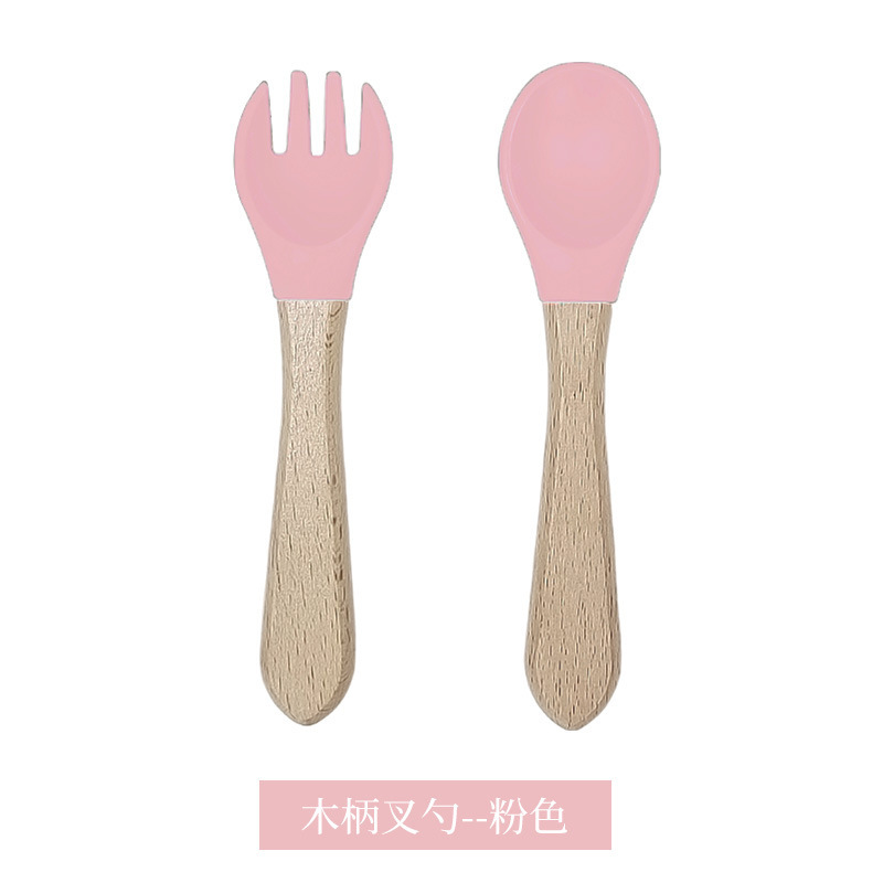 핑크색 나무 포크와 스푼