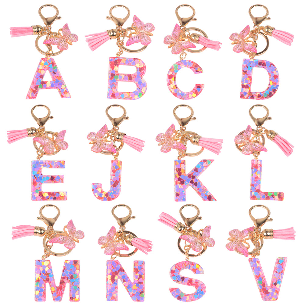 Explosiones transfronterizas amor sequillas iniciales llavero al por mayor resina letra mariposa fringe llavero se puede personalizar