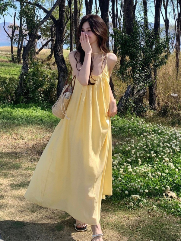 度假风温柔黄色吊带连衣裙女2025夏季新款海边气质宽松显瘦长裙子|undefined