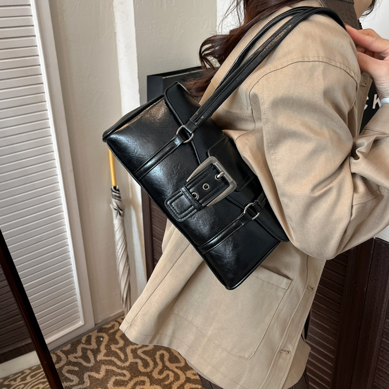 Nicho de alto nivel lujoso hombro bajo la braza bolsa de locomotora 2025 nuevo retro viaje bolso de palo de mujer