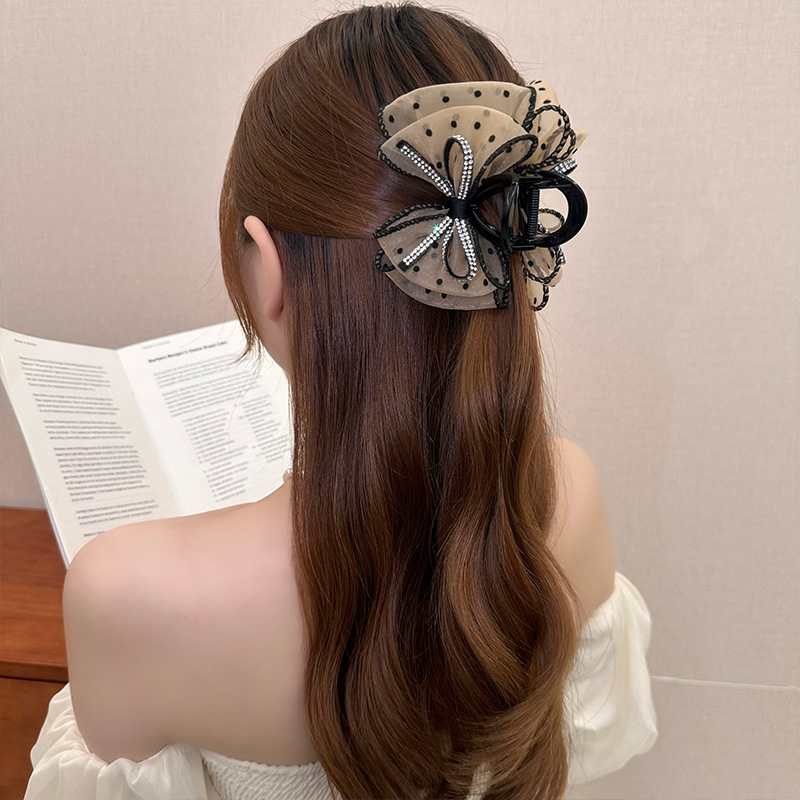 Diamante punto de onda arco clip de agarre para mujeres verano 2025 nuevo estilo de alta calidad burbuja clip de tiburón clip de cabello