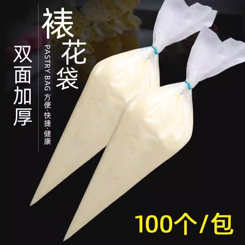 赤ちゃんの赤ちゃんは使い捨ての大中小サイズの表装袋のオイルケーキのチョコレートの表装道具を食べて花袋を絞ります。|undefined