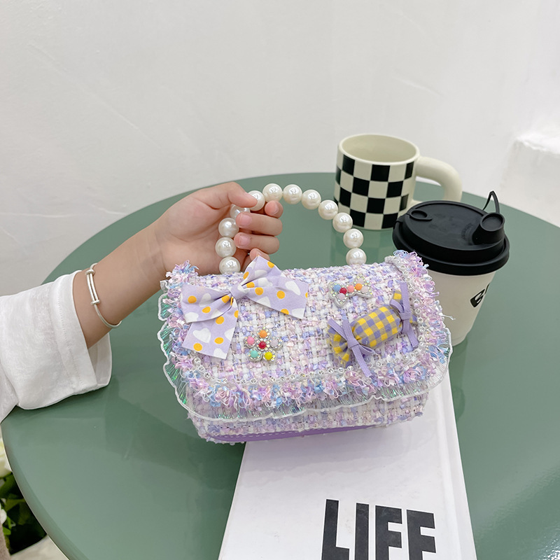 Nuevo bolso de mensajero de La Niña de los niños niña estilo de Chanel estilo occidental Linda niña linda de dibujos animados portátil pequeña bolsa