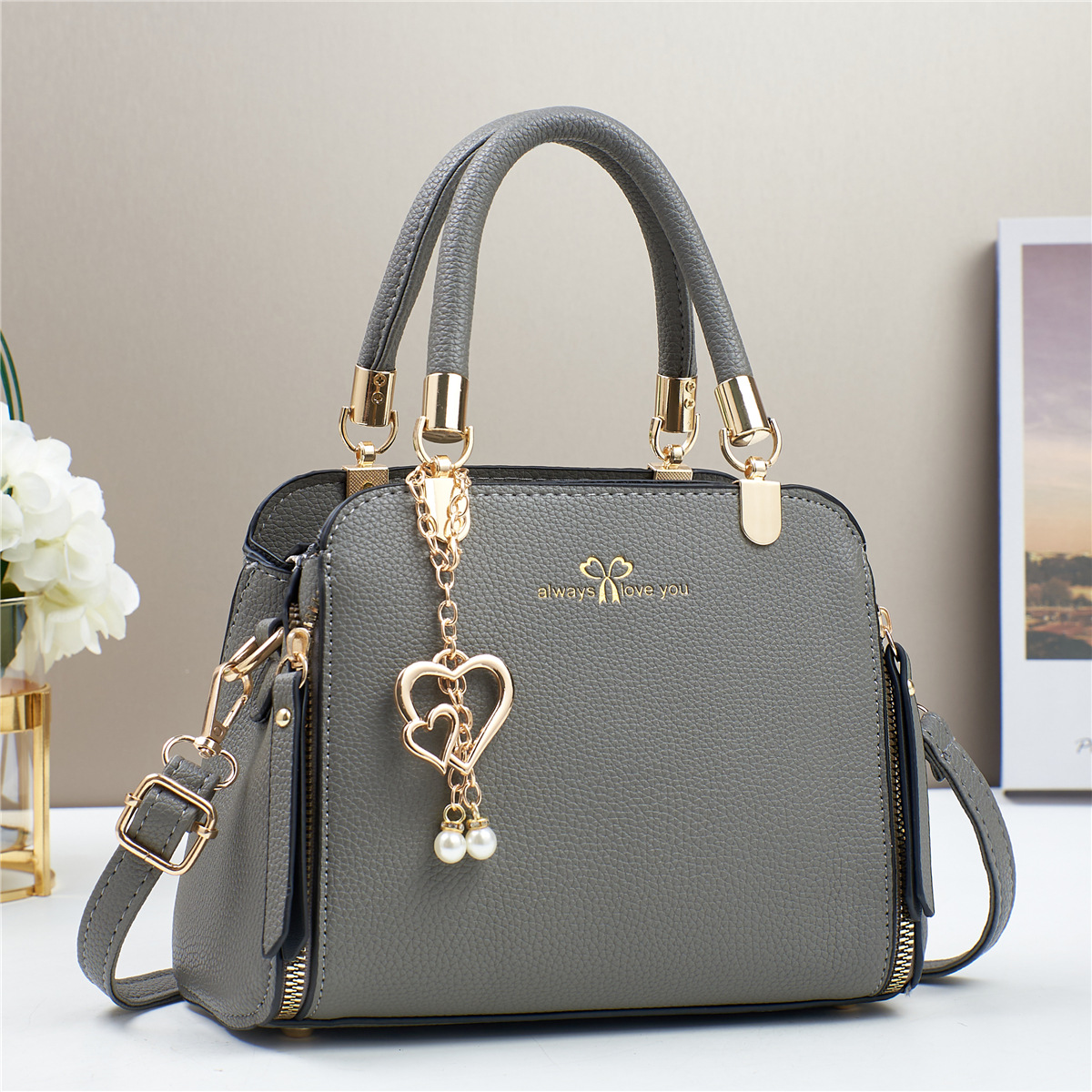 Bolso de mano de explosión bolso de mujer 2025 fabricante de comercio exterior nuevo bolso de hombro de verano atmósfera de moda universal