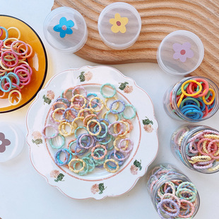 New cartoon children's fluorescent color thumb hair ring 100 boxed rubber band new small ring does not hurt the hair rope