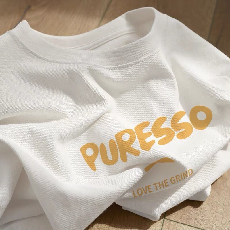 アメリカの純綿の肩の半袖のtシャツの女性2025新型の夏の大きいサイズはゆったりしています。