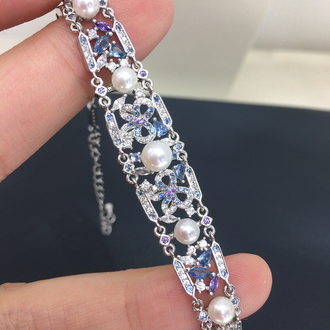 Vòng tay ngọc trai nước ngọt tự nhiên cao cấp đính zircon — bạc