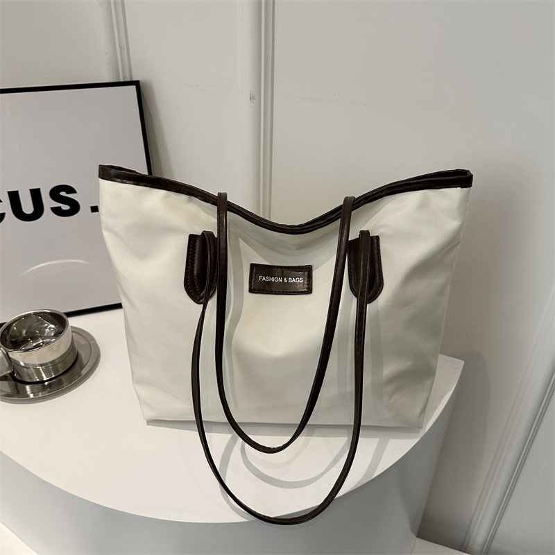 Capacious shoulder bag