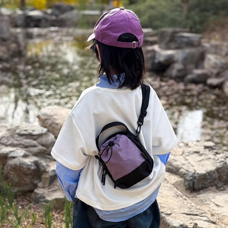 Mochila de mochila para niños cool, personalidad de empalme de colores contrastantes, bolsas de tazas de agua para niños, bolsas de hombro casuales simples coreanas para mujeres