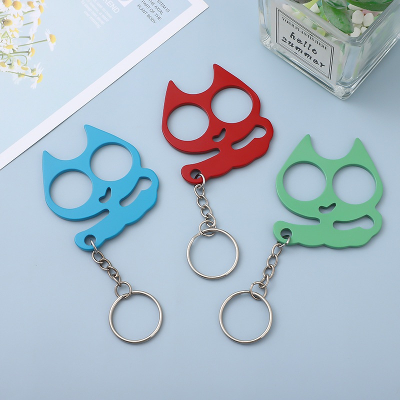 Europe and the United States super cute iron cat broken window double finger buckle self-defense supplies kitten finger new cat eye finger tiger key chain Europe and the United States super cute iron cat broken window double finger buckle self-defense supplies kitten finger new cat eye finger tiger key chain