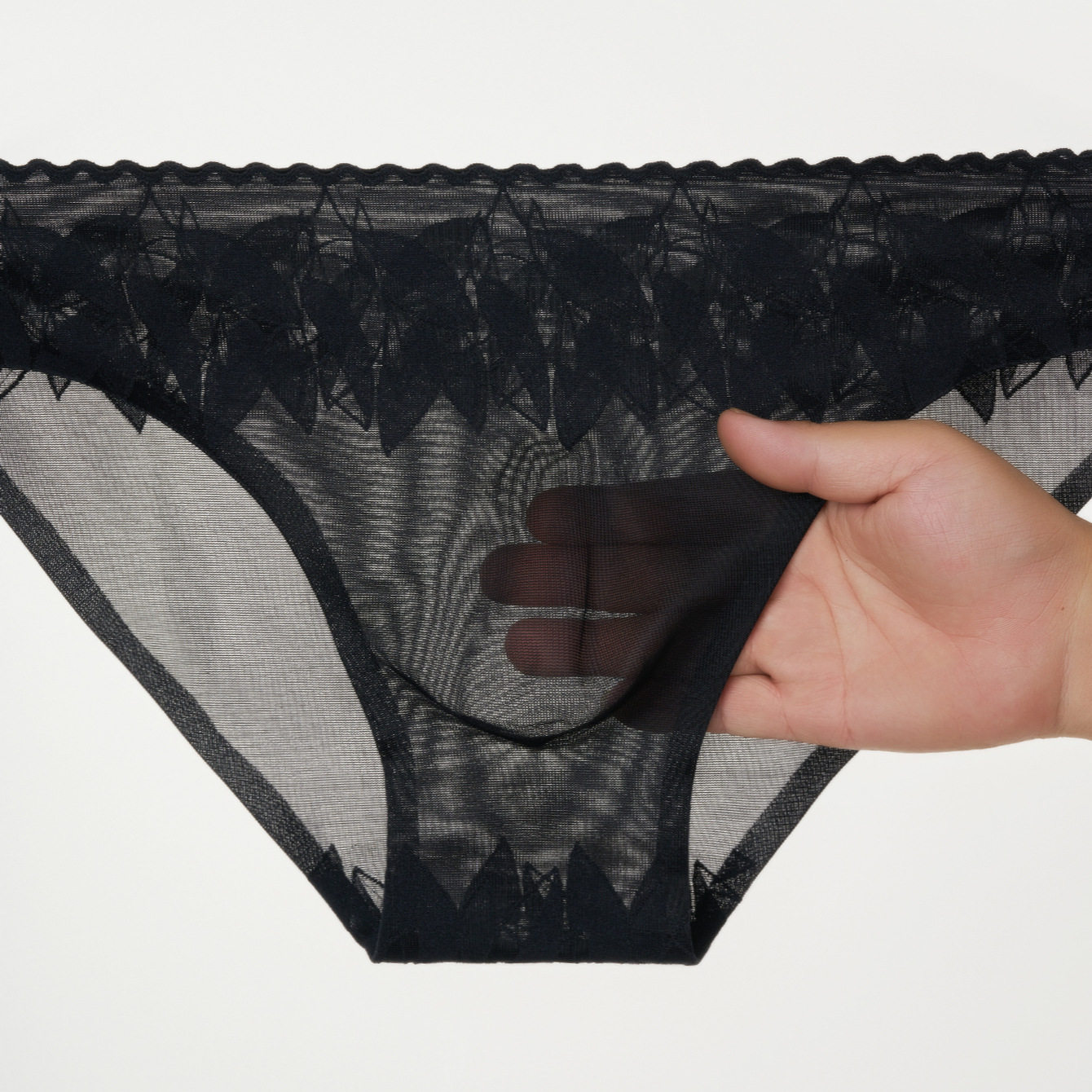 Nuevas calzoncillos de hombre elásticos de encaje 3D bolsas convexas estereoscópicas calzoncillos de hombre sin marcas