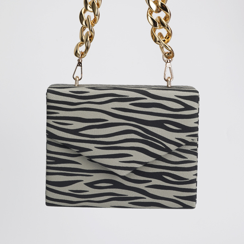 Nuevo patrón de cebra noche bolsa de banquete axilas pu moda todo fósforo de las mujeres hombro portátil crossbody bolsa de cadena para las mujeres