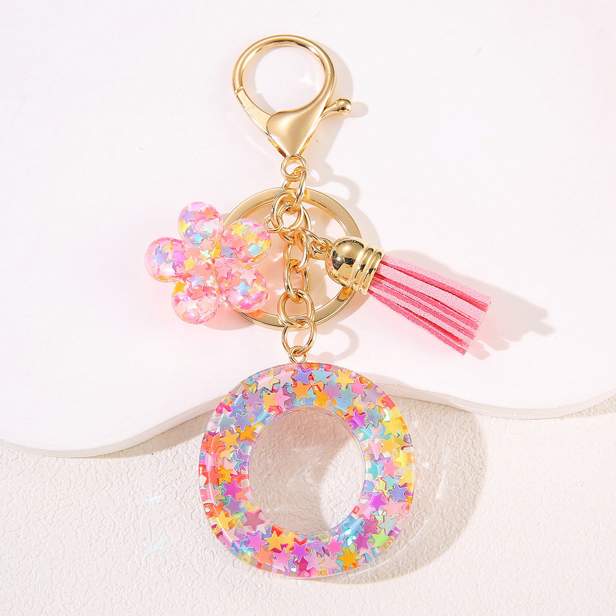 Un nuevo llavero flor de goteo de goma esquinilla 26 letras bolsos colgante llavero accesorios Yiwu