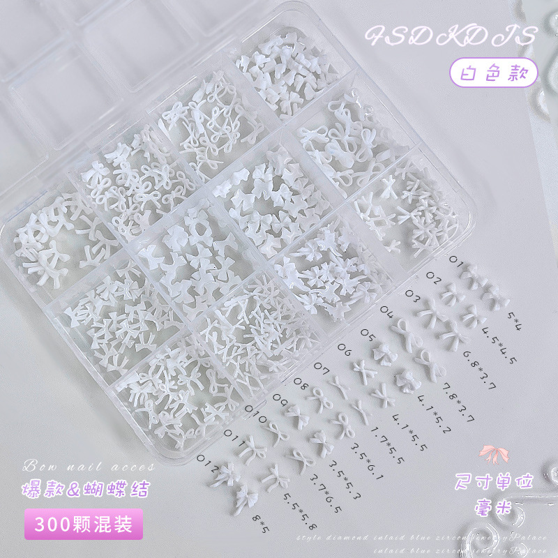 12 cuadros mini bowknot accesorios de uñas tamaño mixto estilo explosivo transfronterizo blanco y negro pajarita rosa accesorios de diamantes de uñas