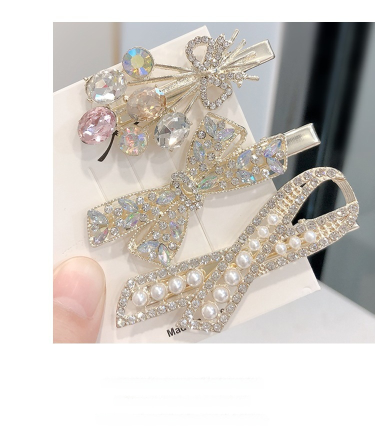 Set di fermagli per capelli eleganti con fiocco perle e cristalli_voghion.com