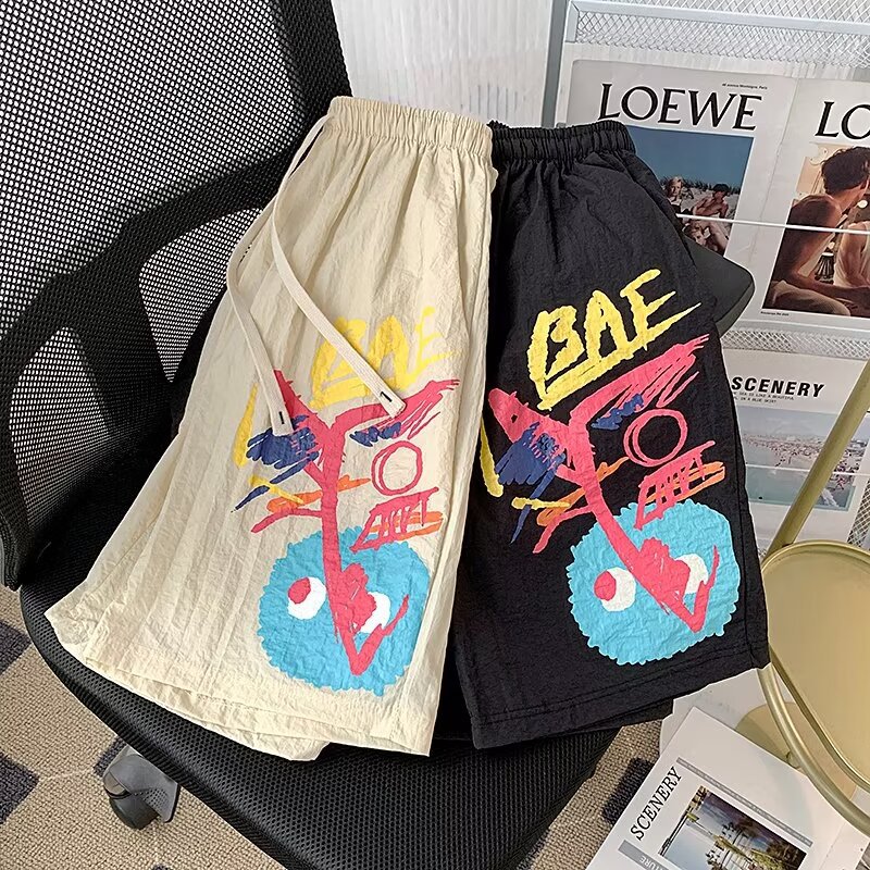 American Graffiti Casual Shorts Hombres Nuevos pantalones de verano de secado rápido de cinco puntos Pantalones de playa sueltos