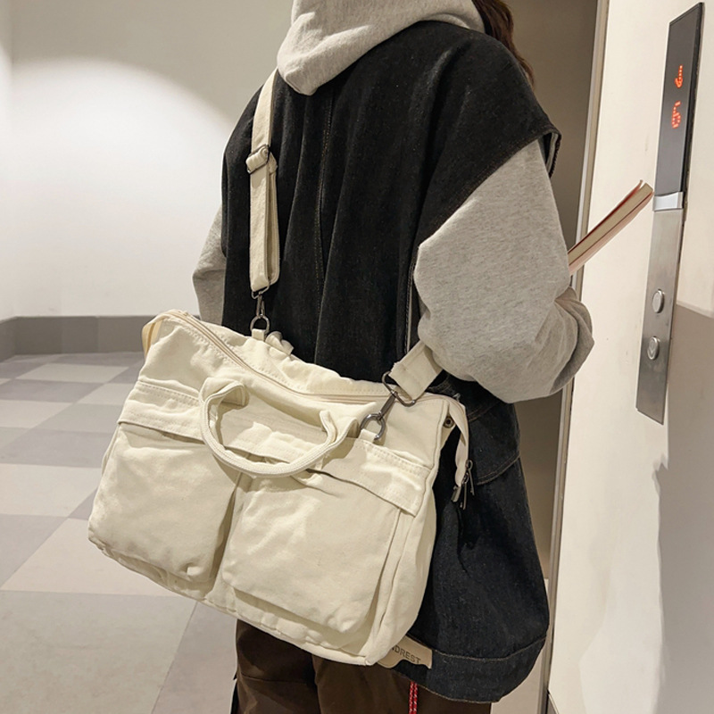 Bolso de lona japonés femenino 2024 nuevo bolso coreano de gran capacidad bolso de mensajero de todo fósforo de color sólido bolso de moda