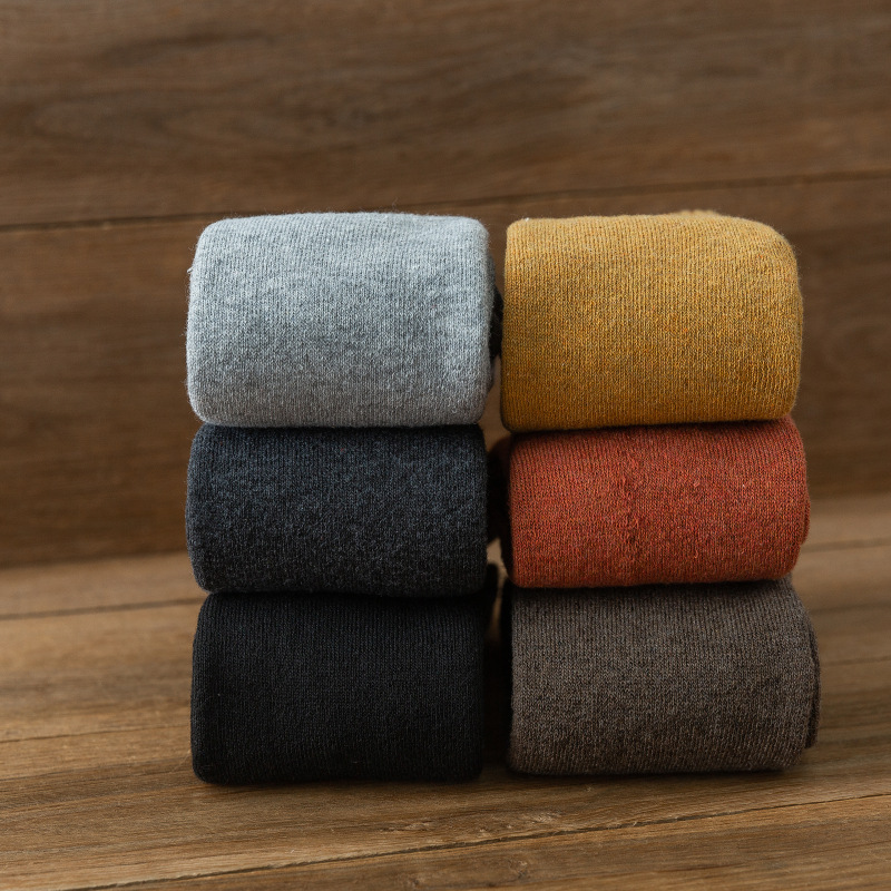 Largos calcetines de las mujeres Terry calcetines de la pantorrilla del otoño y del invierno toalla gruesa forrada de lana calcetines calientes de la pantorrilla del color sólido de la rodilla-longitud