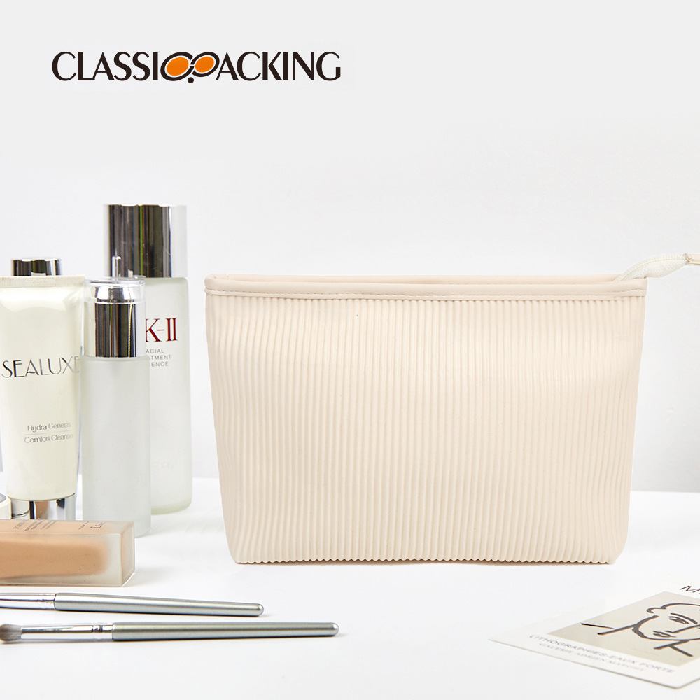 Bolsa de cosméticos japonesa simple, bolsa de lavado portátil de material PU plisado personalizado, bolsa de almacenamiento de productos para el cuidado de la piel de lujo ligero multifuncional