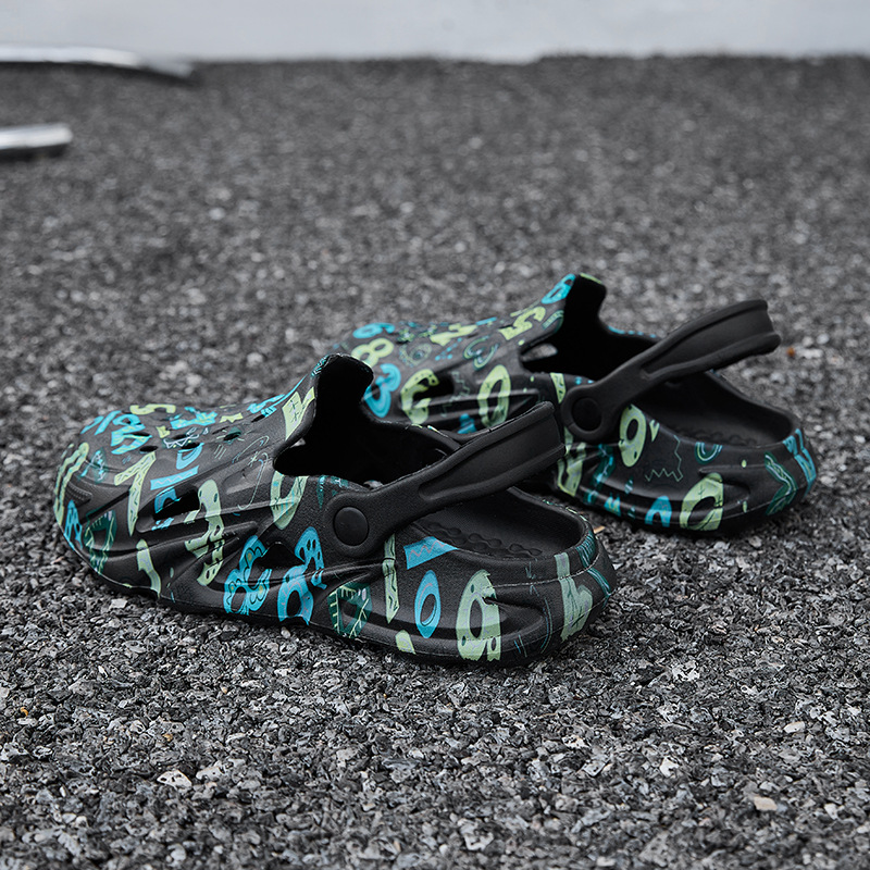 Transfronterizo 2025 nuevo casual de zapatos de playa de tamaño grande pareja de color de arena agujero zapatos de jardín sandalias al por mayor
