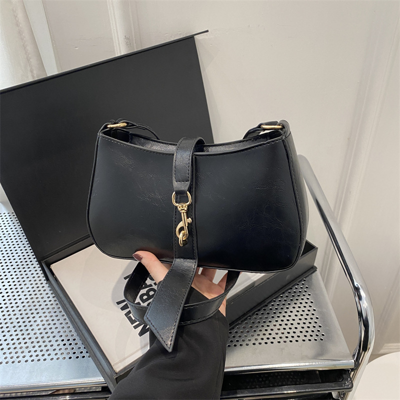 Bolsa de brazo francesa nicho para mujeres 2025 primavera y verano nueva moda moda personalidad bolso de palo estilo coreano bolso de hombro retro